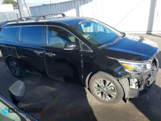 2021 Kia Sedona EX with VIN KNDMC5C10M6671729, listed as a IAAI auction lot 40858206 with 58,775 mi miles. Bid and sale history available at carsss.com. Image 14.