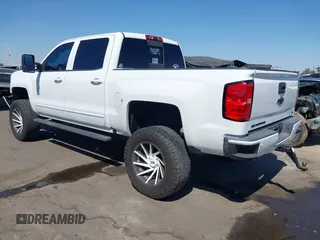 2016 Chevrolet Silverado 1500 LT with VIN 3GCUKREC5GG369915, listed as a IAAI auction lot 42082155 with 137,671 mi miles and . Bid and sale history available at DreamBid. Image 3.