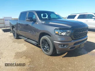 2023 Ram 1500 Big Horn with VIN 1C6SRFFT8PN563045, listed as a IAAI auction lot 42310599 with 40,849 mi miles and . Bid and sale history available at DreamBid. Image 1.