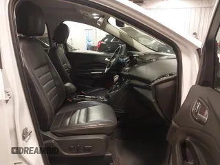 2016 Ford Escape Titanium with VIN 1FMCU9J99GUA61848, listed as a IAAI auction lot 42300324 with 51,692 mi miles and . Bid and sale history available at DreamBid. Image 5.