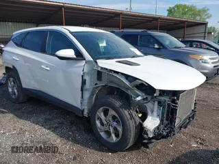 2022 Hyundai Tucson SE z VIN 5NMJACAE3NH012650, wystawiony jako IAAI lot #42137835 z przebiegiem 107 599 mil mil oraz . Historia ofert i sprzedaży dostępna na DreamBid. Obrazek 1.