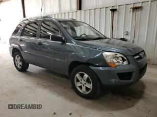 2009 Kia Sportage LX with VIN KNDJE723X97561560, listed as a Copart auction lot 49766995 with 130,623 mi miles and Salvage Title. Bid and sale history available at DreamBid. Image 4.