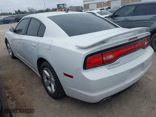 2013 Dodge Charger SXT Plus with VIN 2C3CDXHGXDH537220, listed as a IAAI auction lot 41905479 with 140,075 mi miles. Bid and sale history available at carsss.com. Image 3.