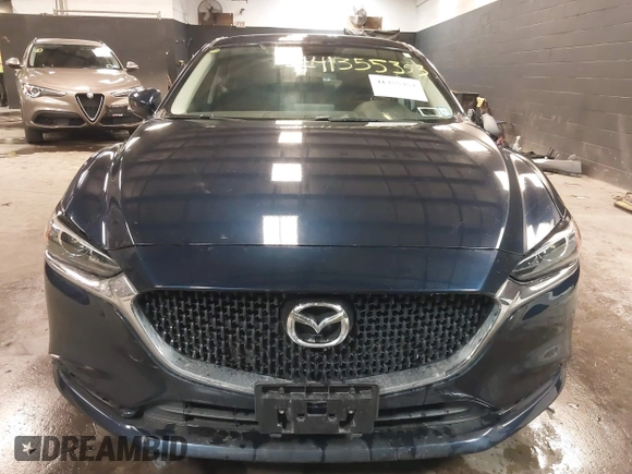 2018 Mazda Mazda6 Sport with VIN JM1GL1UMXJ1330989, listed as a IAAI auction lot 41355353 with 52,869 mi miles. Bid and sale history available at carsss.com. Image 12.