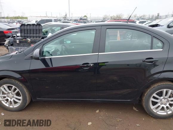 2012 Chevrolet Sonic LT with VIN 1G1JC5SH0C4129096, listed as a IAAI auction lot 42023621 with 45,517 mi miles and . Bid and sale history available at DreamBid. Image 14.