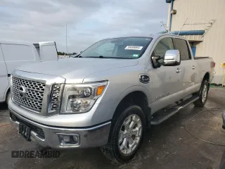 2016 Nissan Titan XD Platinum Reserve with VIN 1N6BA1F46GN513608, listed as a Copart auction lot 39489894 with 158,300 mi miles and Salvage Title. Bid and sale history available at carsss.com. Image 1.
