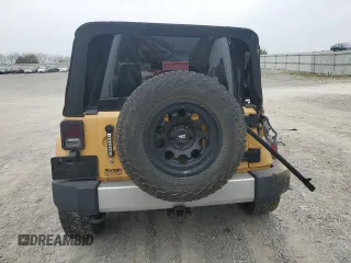 2014 Jeep Wrangler Sahara with VIN 1C4AJWBG8EL144691, listed as a Copart auction lot 71172514 with 111,322 mi miles and Salvage title. Bid and sale history available at DreamBid. Image 6.