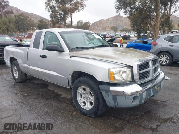 2005 Dodge Dakota SLT with VIN 1D7HE42K05S231198, listed as a IAAI auction lot 41552349 with 149,915 mi miles and . Bid and sale history available at carsss.com. Image 1.