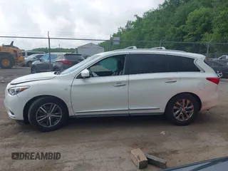 2015 Infiniti QX60 z VIN 5N1AL0MM3FC546979, wystawiony jako IAAI lot #42192346 z przebiegiem 181 679 mil mil oraz . Historia ofert i sprzedaży dostępna na DreamBid. Obrazek 13.
