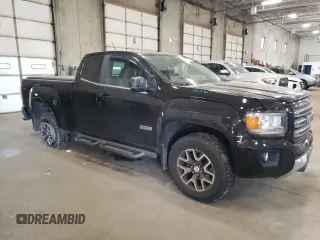 2015 GMC Canyon 4WD SLE with VIN 1GTH6BE32F1168788, listed as a Copart auction lot 76972934 with 158,562 mi miles and Salvage Title. Bid and sale history available at carsss.com. Image 4.