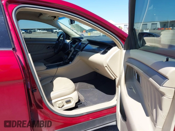 2013 Ford Taurus SEL with VIN 1FAHP2E8XDG231807, listed as a IAAI auction lot 41774166 with 120,639 mi miles and . Bid and sale history available at carsss.com. Image 5.