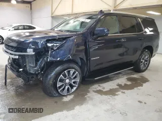 2023 Chevrolet Tahoe LT with VIN 1GNSCNKD0PR380094, listed as a Copart auction lot 48987865 with 51,372 mi miles and Clean title. Bid and sale history available at DreamBid. Image 1.