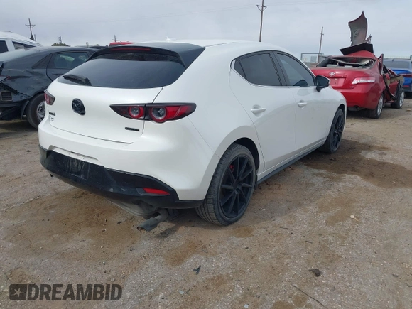 2021 Mazda 3 Premium with VIN JM1BPAML0M1302385, listed as a IAAI auction lot 41397521 with 55,907 mi miles and . Bid and sale history available at DreamBid. Image 4.