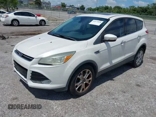 2013 Ford Escape SEL z VIN 1FMCU0H94DUD22476, wystawiony jako IAAI lot #42673808 z przebiegiem 215 811 mil mil oraz . Historia ofert i sprzedaży dostępna na DreamBid. Obrazek 2.