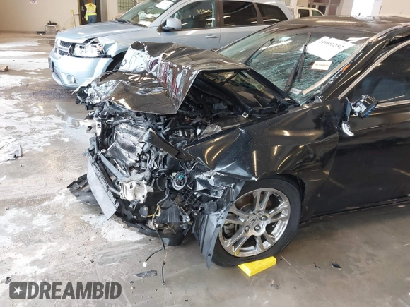 2009 Acura TL Tech with VIN 19UUA86549A010863, listed as a IAAI auction lot 41001252 with 186,441 mi miles. Bid and sale history available at carsss.com. Image 6.