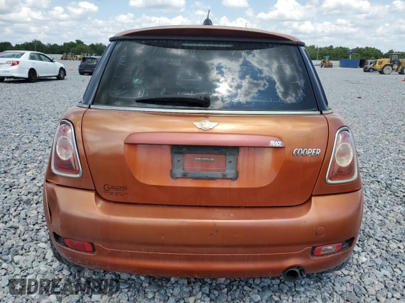 2011 MINI Hardtop with VIN WMWSU3C52BT094399, listed as a Copart auction lot 56561635 with 94,428 mi miles and Salvage Title. Bid and sale history available at DreamBid. Image 6.