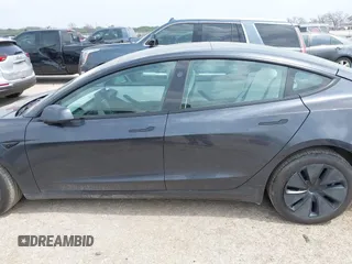 2024 Tesla Model 3 z VIN 5YJ3E1EA5RF870377, wystawiony jako IAAI lot #41933727 z przebiegiem 2 183 mil mil oraz . Historia ofert i sprzedaży dostępna na DreamBid. Obrazek 14.