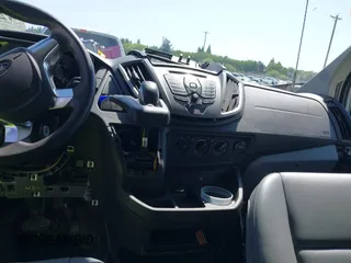 2015 Ford Transit Passenger XL z VIN 1FBAX2CG7FKA75719, wystawiony jako IAAI lot #42135118 z przebiegiem Nie podano mil oraz . Historia ofert i sprzedaży dostępna na DreamBid. Obrazek 6.