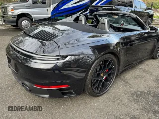 2022 Porsche 911 Carrera S z VIN WP0CB2A90NS244999, wystawiony jako Copart lot #56801295 z przebiegiem 1735 mil mil oraz Nie do naprawy. Historia ofert i sprzedaży dostępna na DreamBid. Obrazek 13.
