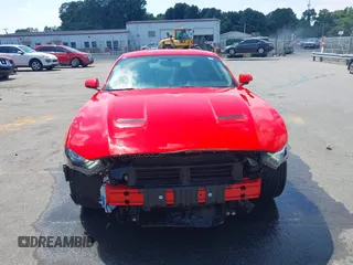 2020 Ford Mustang EcoBoost with VIN 1FA6P8TH4L5157629, listed as a IAAI auction lot 42650450 with 34,152 mi miles and . Bid and sale history available at DreamBid. Image 12.