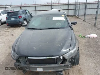 2013 Ford Taurus SHO z VIN 1FAHP2KT6DG174191, wystawiony jako IAAI lot #41752293 z przebiegiem 147 607 mil mil oraz . Historia ofert i sprzedaży dostępna na DreamBid. Obrazek 13.