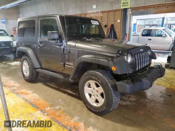 2017 Jeep Wrangler Willys Wheeler with VIN 1C4AJWAG3HL751703, listed as a Copart auction lot 88861635 with 14,114 mi miles and Salvage Title. Bid and sale history available at DreamBid. Image 4.