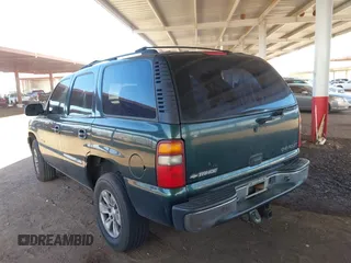 2002 Chevrolet Tahoe LT z VIN 1GNEK13ZX2J257347, wystawiony jako IAAI lot #42433634 z przebiegiem 252 817 mil mil oraz . Historia ofert i sprzedaży dostępna na DreamBid. Obrazek 3.