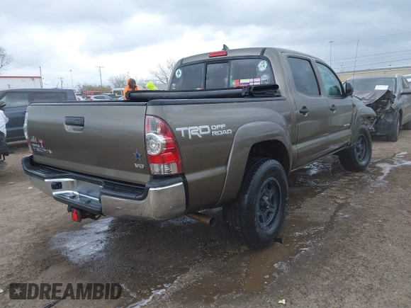 2015 Toyota Tacoma with VIN 3TMLU4EN8FM198605, listed as a IAAI auction lot 42039238 with 132,109 mi miles and . Bid and sale history available at DreamBid. Image 4.