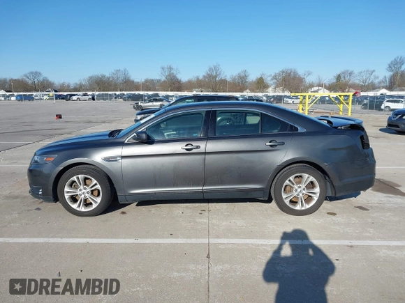 2016 Ford Taurus SEL with VIN 1FAHP2E88GG157761, listed as a IAAI auction lot 41937397 with 129,142 mi miles and . Bid and sale history available at DreamBid. Image 14.