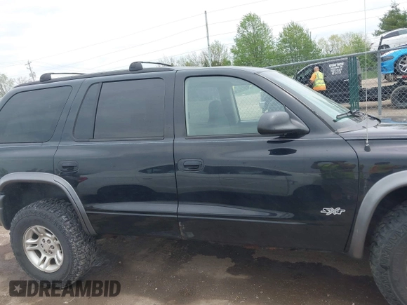 2002 Dodge Durango Sport z VIN 1B4HS38N02F193570, wystawiony jako IAAI lot #42138656 z przebiegiem 161 411 mil mil oraz . Historia ofert i sprzedaży dostępna na DreamBid. Obrazek 13.