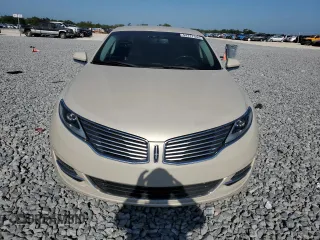 2016 Lincoln MKZ z VIN 3LN6L2G93GR615052, wystawiony jako Copart lot #54717335 z przebiegiem 86 575 mil mil oraz Szkoda całkowita • Salvage title. Historia ofert i sprzedaży dostępna na DreamBid. Obrazek 5.