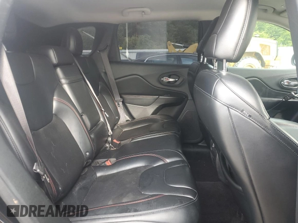 2019 Jeep Cherokee Trailhawk with VIN 1C4PJMBX9KD183116, listed as a Copart auction lot 58518265 with 124,258 mi miles and Salvage title. Bid and sale history available at DreamBid. Image 11.