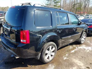 2015 Honda Pilot Touring with VIN 5FNYF3H97FB016390, listed as a IAAI auction lot 41753590 with 217,156 mi miles. Bid and sale history available at carsss.com. Image 4.
