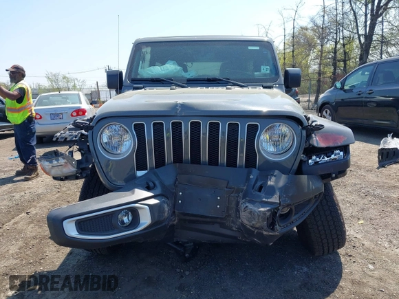 2022 Jeep Wrangler Unlimited Sahara with VIN 1C4HJXEM7NW206585, listed as a IAAI auction lot 42102516 with 10,769 mi miles and . Bid and sale history available at DreamBid. Image 13.