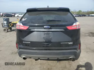 2020 Ford Edge Titanium z VIN 2FMPK3K94LBA15685, wystawiony jako Copart lot #54094585 z przebiegiem Nie podano mil oraz Szkoda całkowita • Salvage title. Historia ofert i sprzedaży dostępna na DreamBid. Obrazek 6.