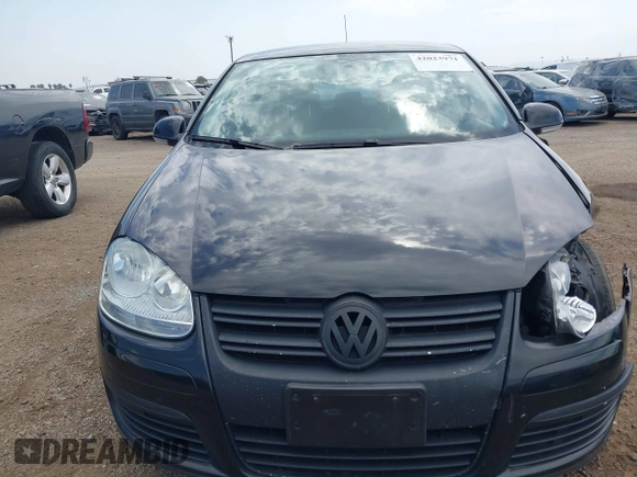 2010 Volkswagen Jetta Sedan S with VIN 3VWJZ7AJ2AM060044, listed as a IAAI auction lot 42023971 with 106,228 mi miles. Bid and sale history available at carsss.com. Image 12.