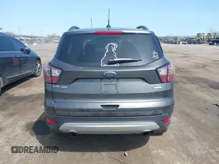 2017 Ford Escape SE z VIN 1FMCU0GD0HUE06774, wystawiony jako IAAI lot #42135955 z przebiegiem 141 807 mil mil oraz . Historia ofert i sprzedaży dostępna na DreamBid. Obrazek 17.