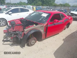 2016 Dodge Challenger R/T Plus with VIN 2C3CDZBT8GH120622, listed as a IAAI auction lot 42661468 with Not provided miles and . Bid and sale history available at DreamBid. Image 2.