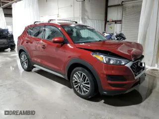 2020 Hyundai Tucson SEL with VIN KM8J3CAL7LU086146, listed as a Copart auction lot 52066105 with 121,334 mi miles and Salvage Title. Bid and sale history available at carsss.com. Image 4.