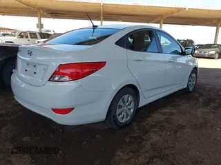 2016 Hyundai Accent SE z VIN KMHCT4AEXGU127858, wystawiony jako IAAI lot #41847611 z przebiegiem 146 096 mil mil oraz . Historia ofert i sprzedaży dostępna na DreamBid. Obrazek 4.