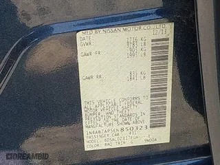 2014 Nissan Sentra S with VIN 1N4AB7AP5EN850323, listed as a IAAI auction lot 41820885 with 136,888 mi miles. Bid and sale history available at carsss.com. Image 9.