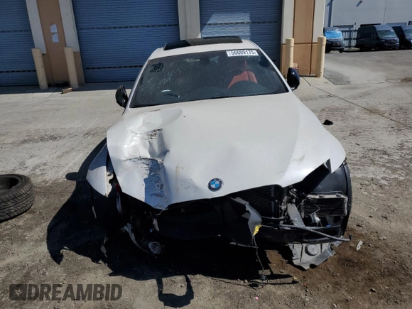 2012 BMW 3 Series 335is with VIN WBAKG1C50CJ217108, listed as a Copart auction lot 56609175 with 105,899 mi miles and Salvage title. Bid and sale history available at DreamBid. Image 5.