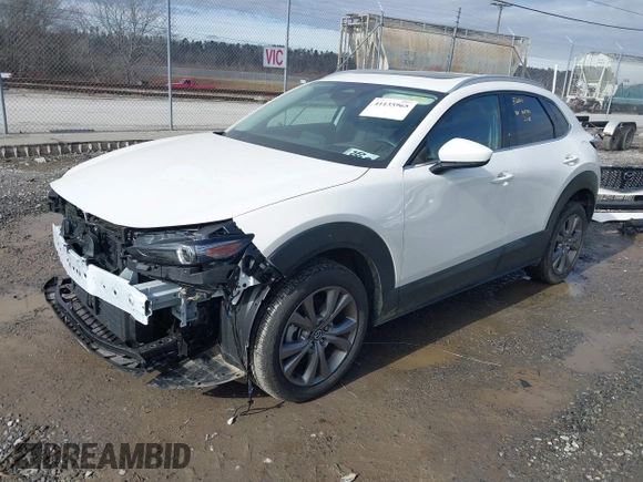 2024 Mazda CX-30 S Premium with VIN 3MVDMBDM5RM630460, listed as a IAAI auction lot 41135965 with 5,544 mi miles and . Bid and sale history available at DreamBid. Image 2.
