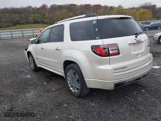 2014 GMC Acadia Denali with VIN 1GKKVTKD2EJ271871, listed as a IAAI auction lot 41699704 with 177,496 mi miles. Bid and sale history available at carsss.com. Image 3.