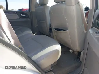 2006 GMC Envoy SLT with VIN 1GKDS13S062128531, listed as a IAAI auction lot 41458983 with 119,385 mi miles. Bid and sale history available at carsss.com. Image 8.