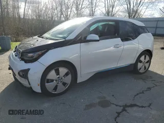 2014 BMW i3 with VIN WBY1Z4C57EV277634, listed as a Copart auction lot 51701885 with 0 mi miles and Salvage Title. Bid and sale history available at carsss.com. Image 1.