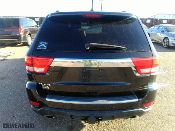 2012 Jeep Grand Cherokee Overland with VIN 1C4RJFCT8CC268410, listed as a IAAI auction lot 41823909 with 205,940 mi miles. Bid and sale history available at carsss.com. Image 16.