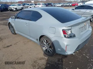2014 Scion tC z VIN JTKJF5C71E3081033, wystawiony jako IAAI lot #41928949 z przebiegiem 144 112 mil mil oraz . Historia ofert i sprzedaży dostępna na DreamBid. Obrazek 3.