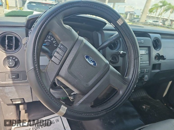 2014 Ford F-150 XL with VIN 1FTMF1CM5EKD54547, listed as a IAAI auction lot 42729479 with 188,818 mi miles and . Bid and sale history available at DreamBid. Image 12.