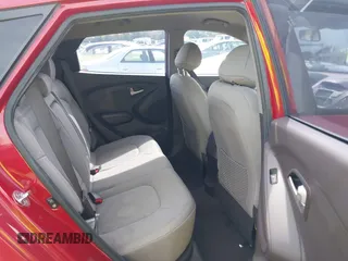 2010 Hyundai Tucson GLS with VIN KM8JT3AC1AU097317, listed as a IAAI auction lot 41758296 with 108,695 mi miles and . Bid and sale history available at DreamBid. Image 8.